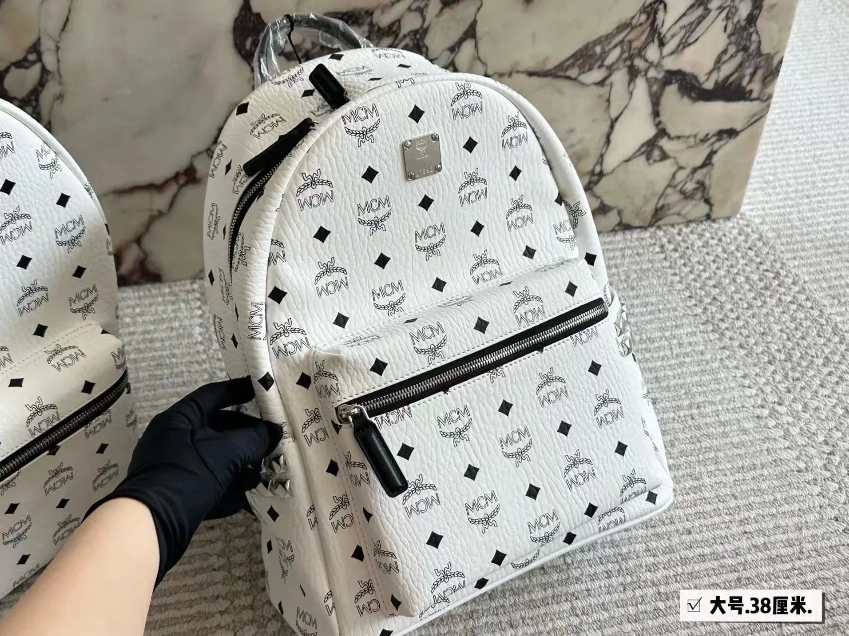 MCM Backpacks Visetos logo-print studded backpack — White 38*30cm