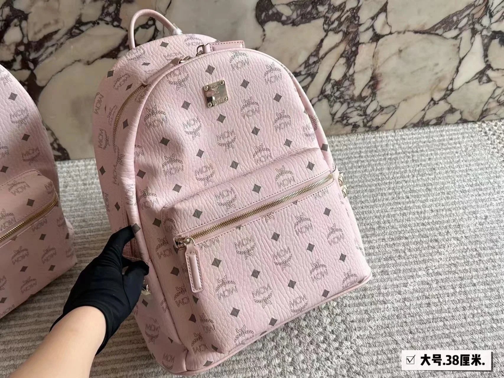 MCM Backpacks Visetos logo-print studded backpack — Pink 38*30cm