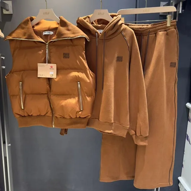 Miu Matching Sets Three-piece set with padded zip vest, hooded sweatshirt and wide-leg trousers product detail image 4
