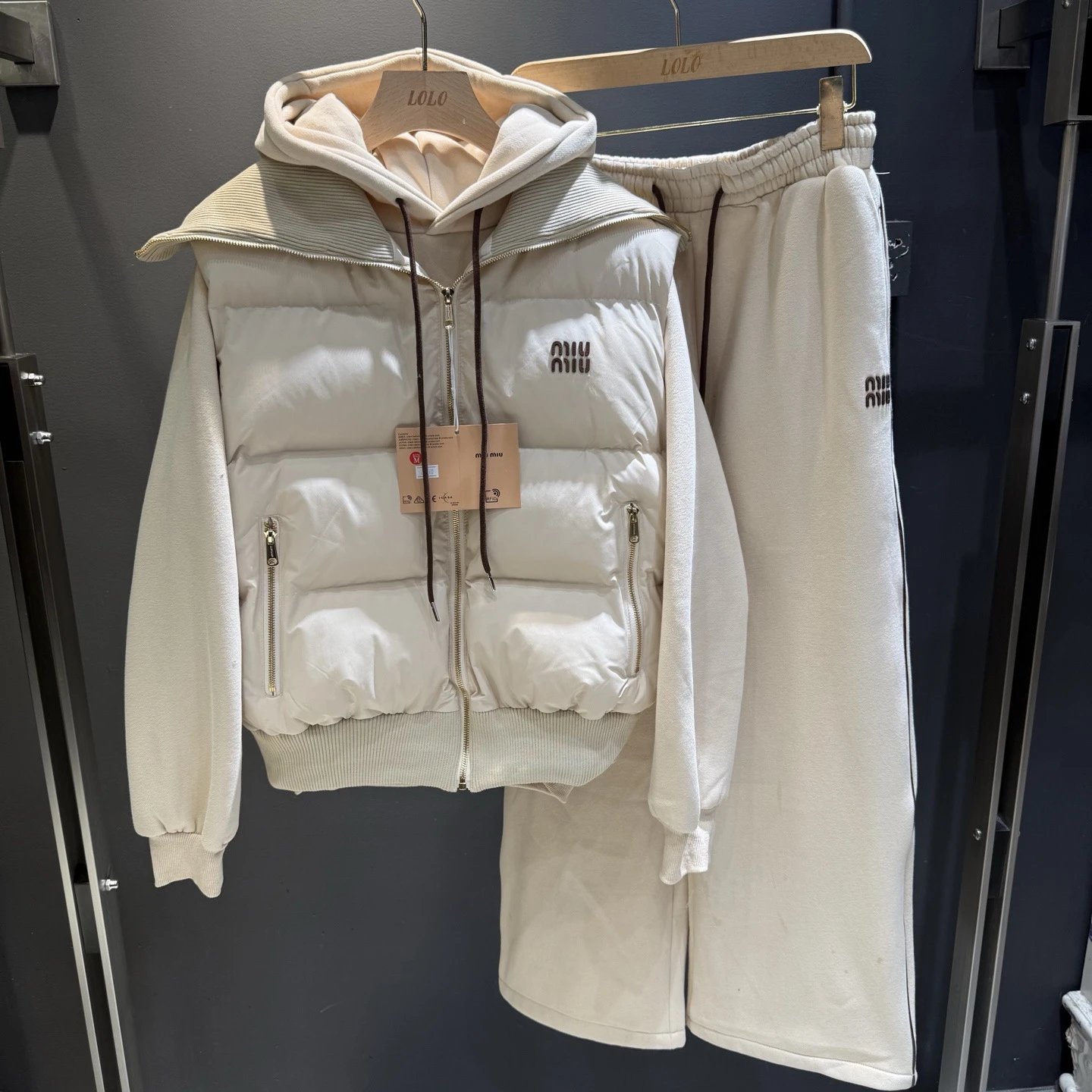 Miu Matching Sets Three-piece set with padded zip vest, hooded sweatshirt and wide-leg trousers image 2