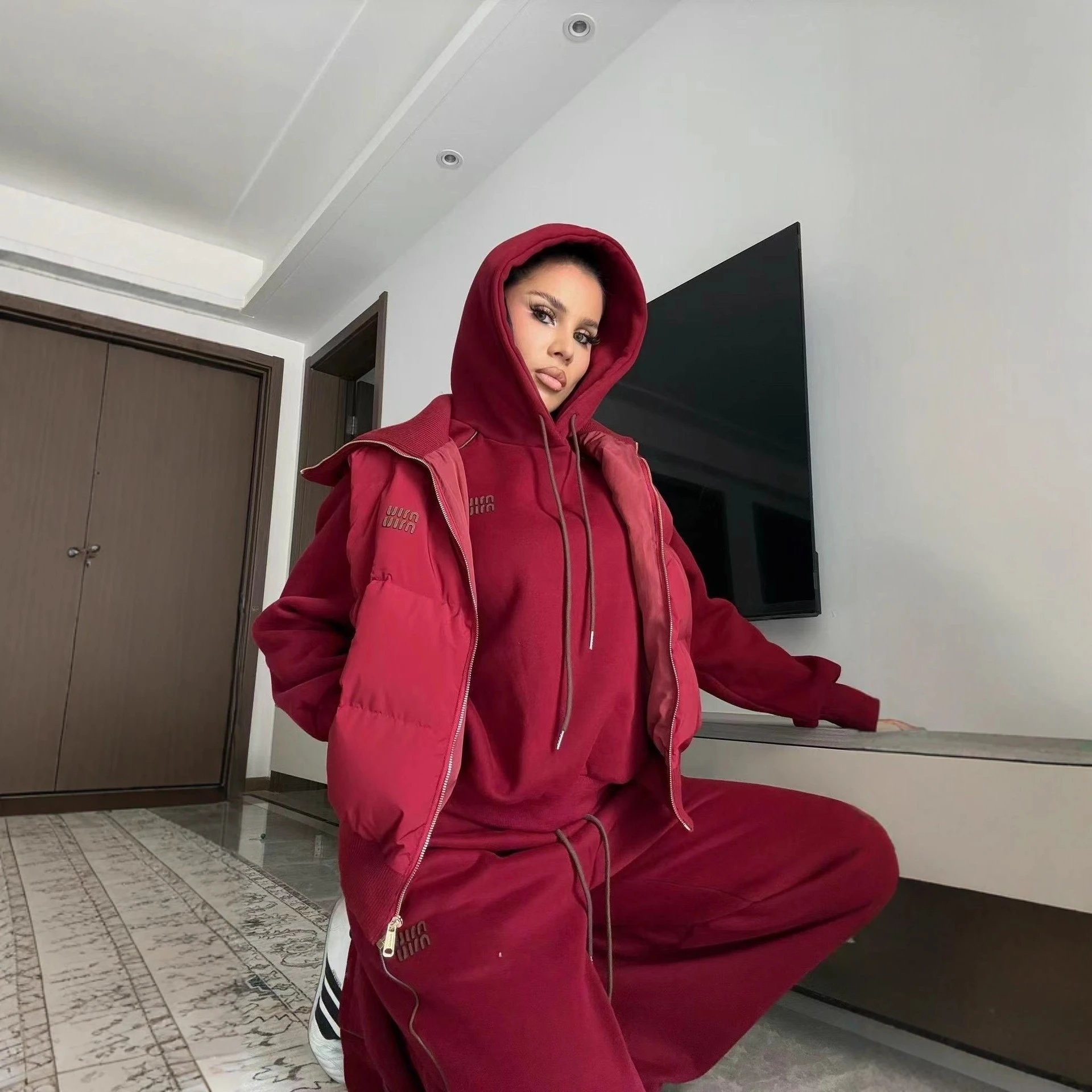 Miu Matching Sets Three-piece set with padded zip vest, hooded sweatshirt and wide-leg trousers image 5
