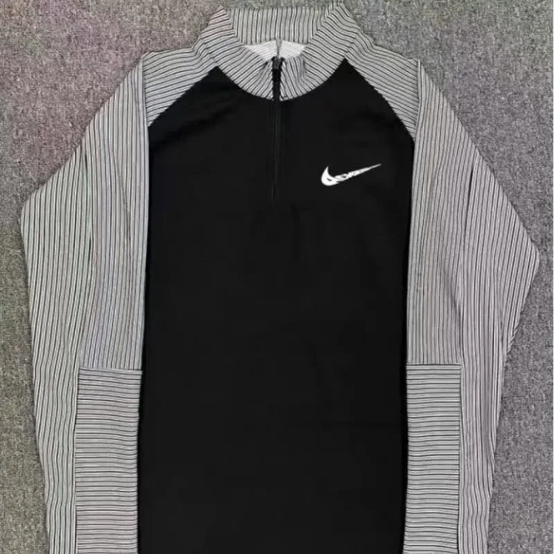 Nike Trousers Tapered running with zip pockets and reflective details — Threaded Half-Zip -1
