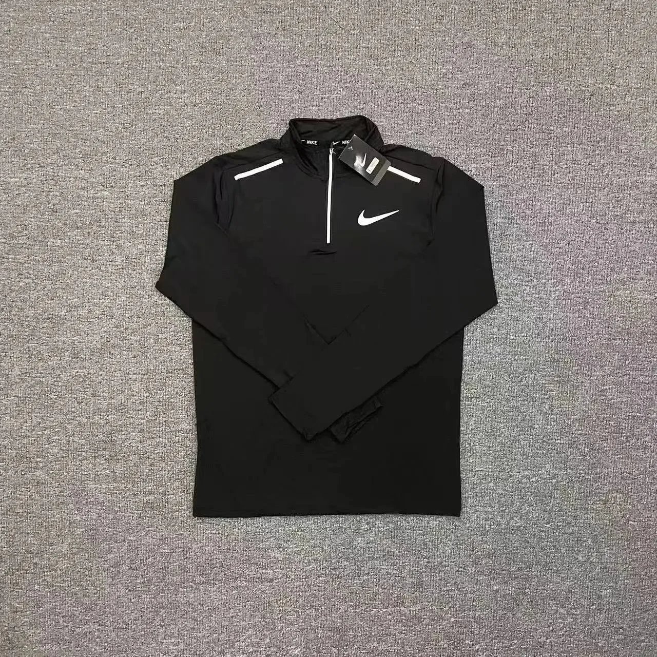 Nike Trousers Tapered running with zip pockets and reflective details — Black reflective
