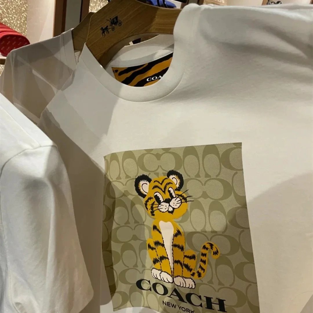 Coach T-Shirts Short-Sleeve Graphic Crewneck — 21