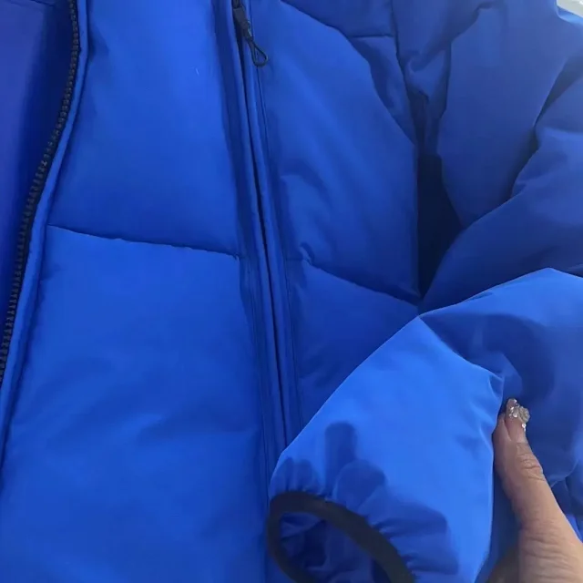 Moncler Down Jackets Hooded puffer jacket with logo trim product detail image 3