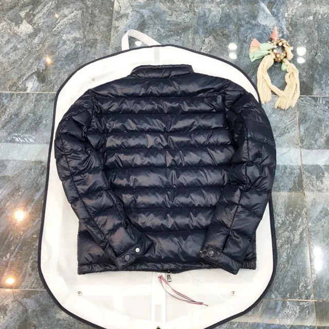 Moncler Down Jackets Short quilted puffer jacket with stand collar and zip pockets product detail image 5