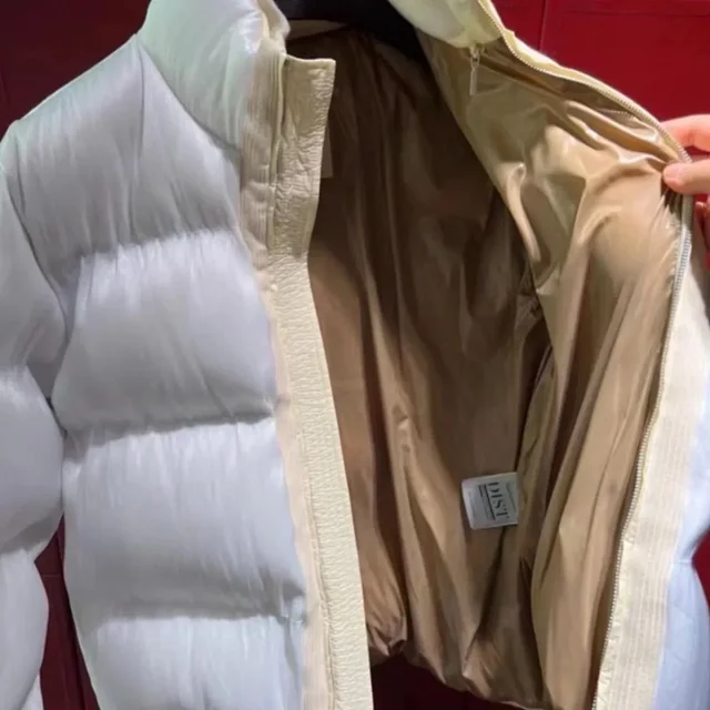 Moncler Down Jackets Reflective padded stand-collar jacket product detail image 12