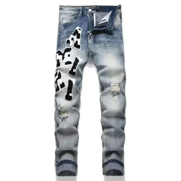 Amiri Distressed Patchwork Denim Jeans - 1