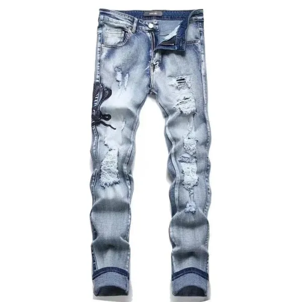 Amiri Distressed Patchwork Denim Jeans - 1