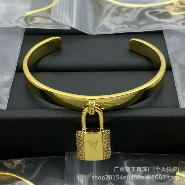 Louis Vuitton Lock It Cuff Gold Tone Crystal-Embellished Bracelet Jewelry - 1