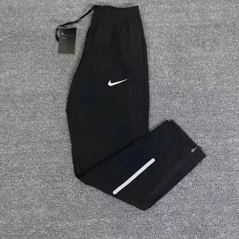 Nike Tracksuits Quarter-Zip Training Top and Zip-Hem Trousers Set image 9