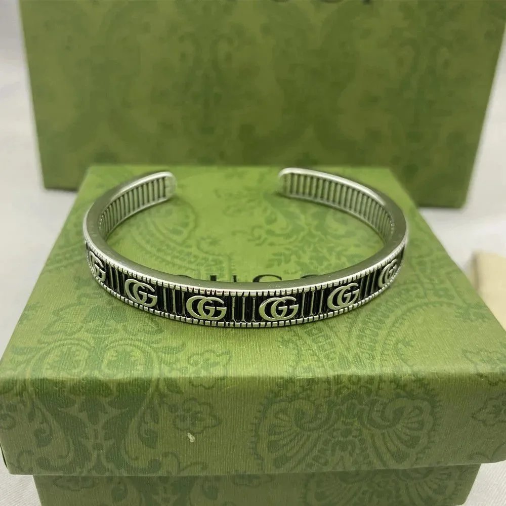 Gucci Silver Interlocking G and Tiger Head Bracelets product photo 2