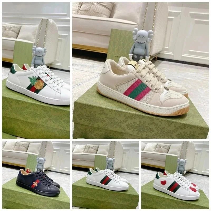 Gucci Low-top sneakers with signature web stripe and embroidered motifs