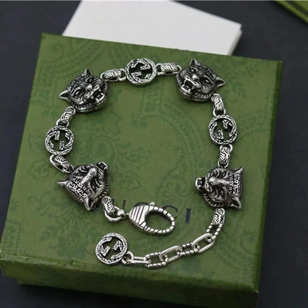 Gucci Silver Interlocking G and Tiger Head Bracelets product photo 3