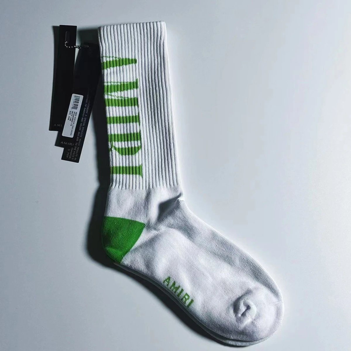 202300403 ARI 白色后跟（绿）字母