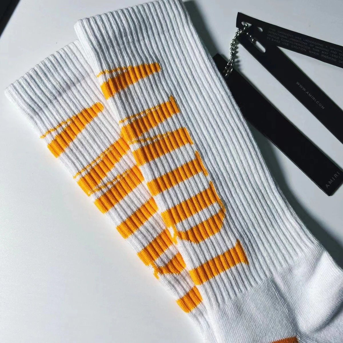 202300414 ARI后跟字母白色（橘））字母