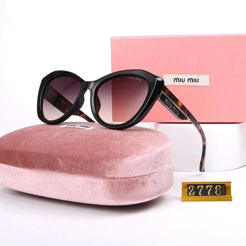 Miu Miu Sunglasses Black Tortoiseshell Cat-Eye Sunglasses