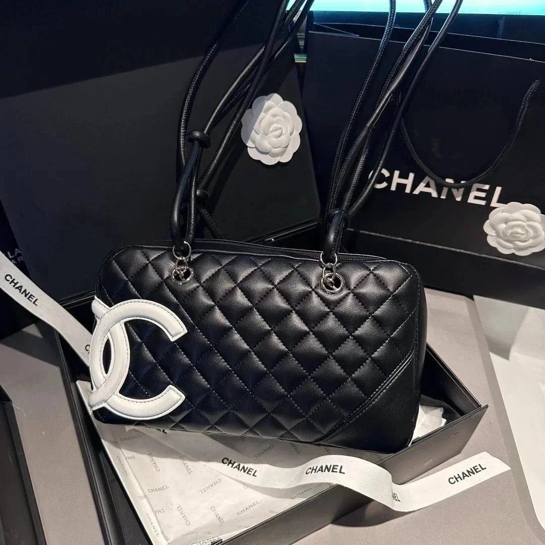 Chanel Quilted CC Logo Black Handbag - 1