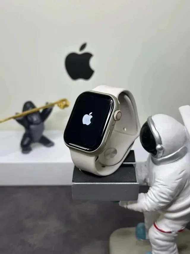 Apple Watch Series 9 GPS + Cellular Stainless Steel Case with White Sport Band Smartwatch