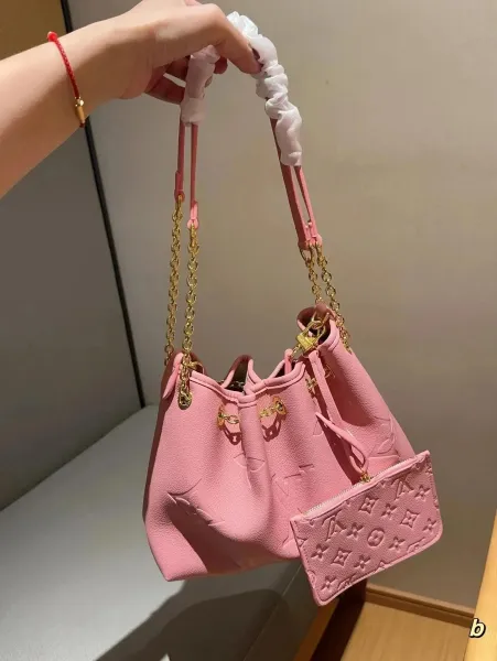 Louis Vuitton Neo Noé Bucket Bag Pink Monogram Empreinte with Chain Strap and Pouch - 1