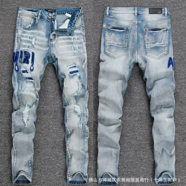 Amiri Distressed Logo Embroidery Light Wash Jeans - 1