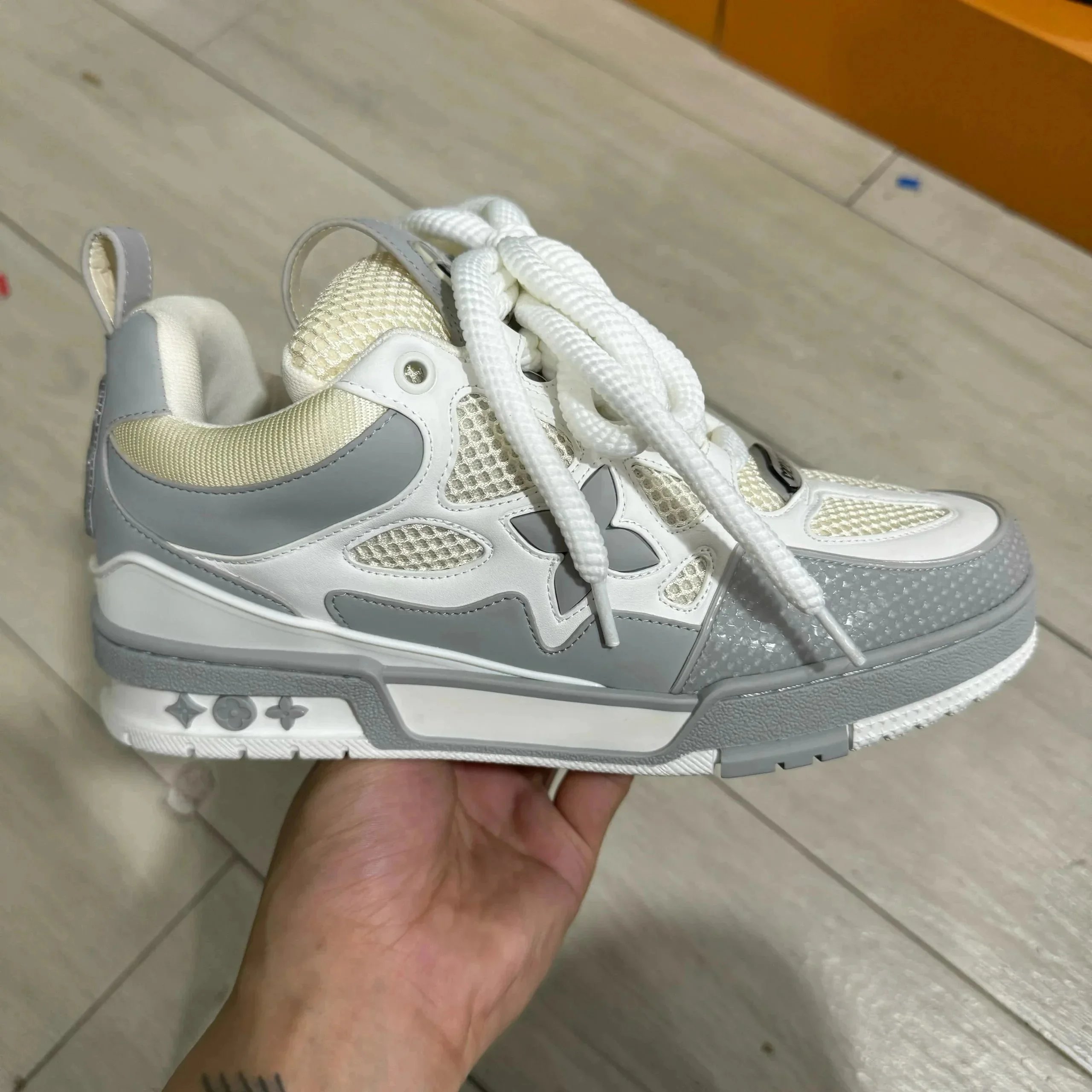 LV ice skates gray