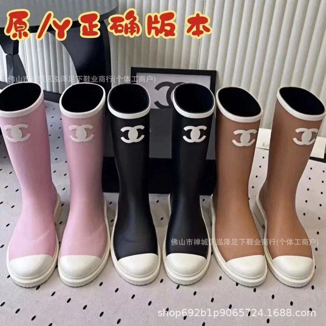 Pink Chanel rain boots