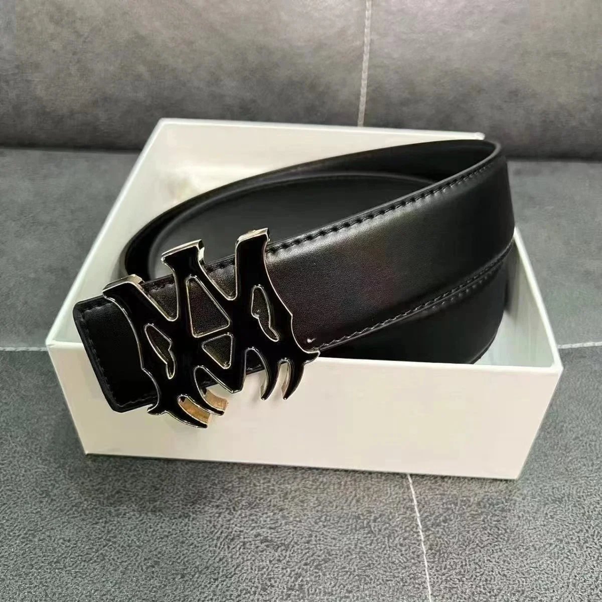 AM Gold Black Buckle Smooth Texture