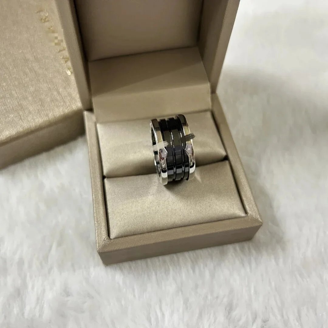 三环白金黑戒指
