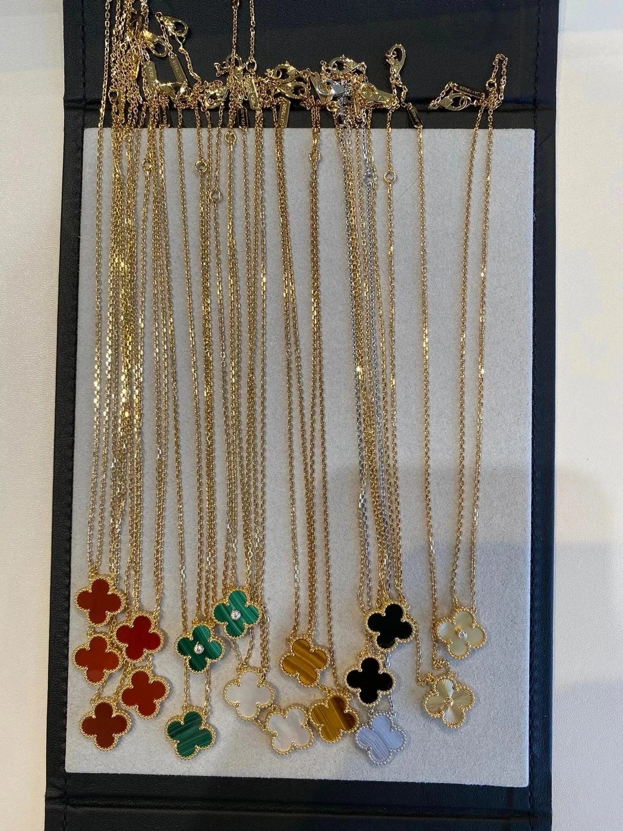 Van Cleef & Arpels Style Vintage Alhambra Clover Necklaces in Multiple Colors (Red Carnelian, Malachite, Tiger's Eye, Onyx, Mother-of-Pearl)