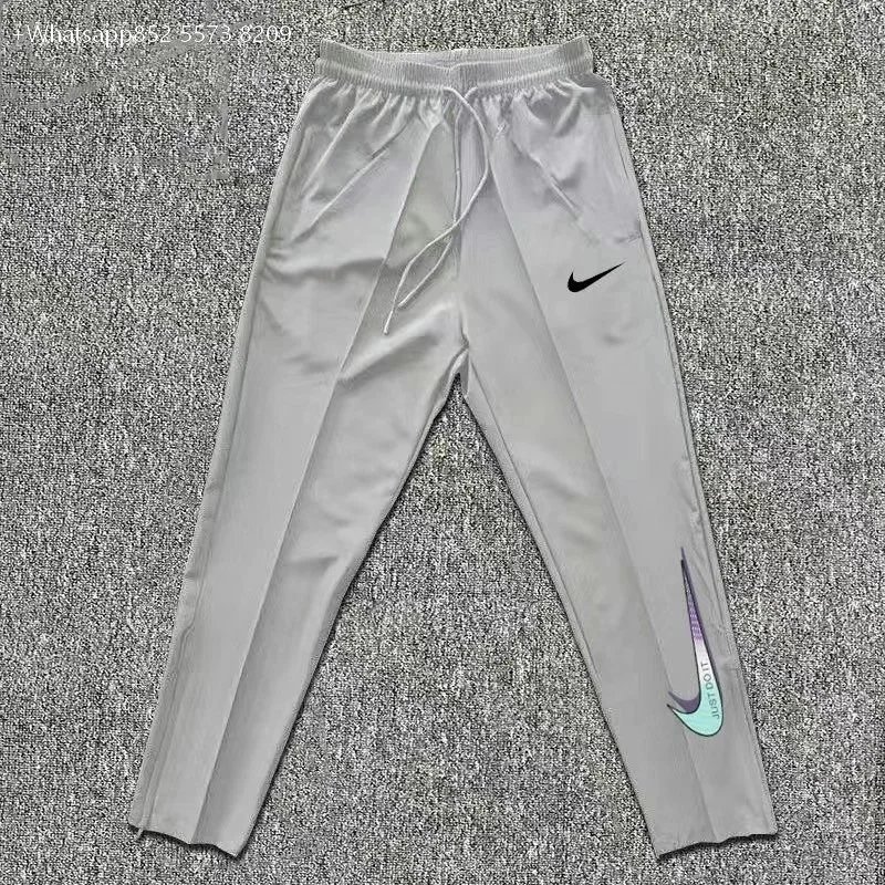 Nike Jackets Hooded colour-block zip windbreaker — Gray pants 01