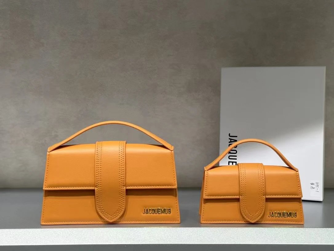 Jacquemus Crossbody Bags Structured flap top-handle bag — Orange