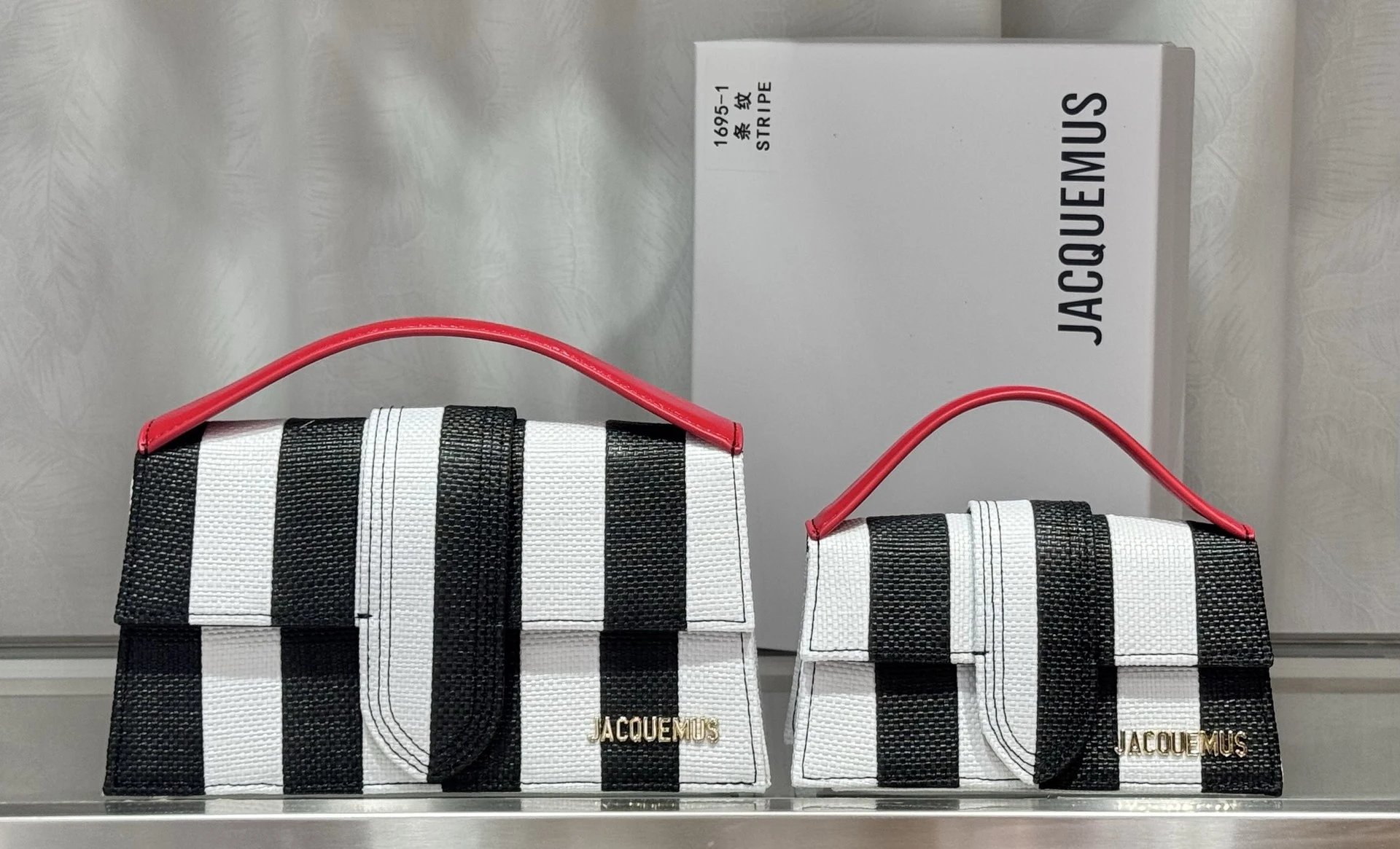 Jacquemus Crossbody Bags Structured flap top-handle bag — stripes