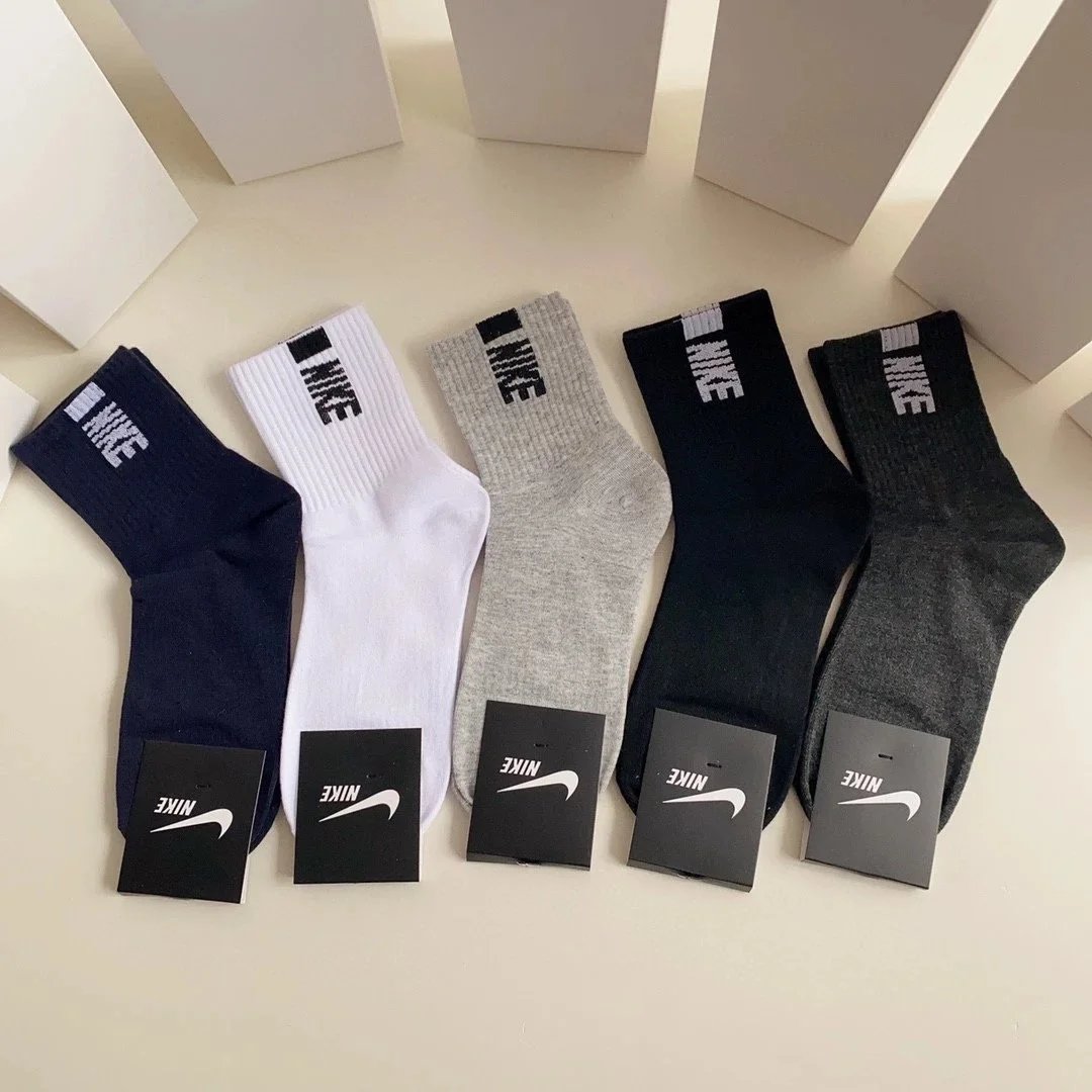 Nike Swoosh Logo Crew Socks in Navy, White, Gray, Black, and Charcoal - 14