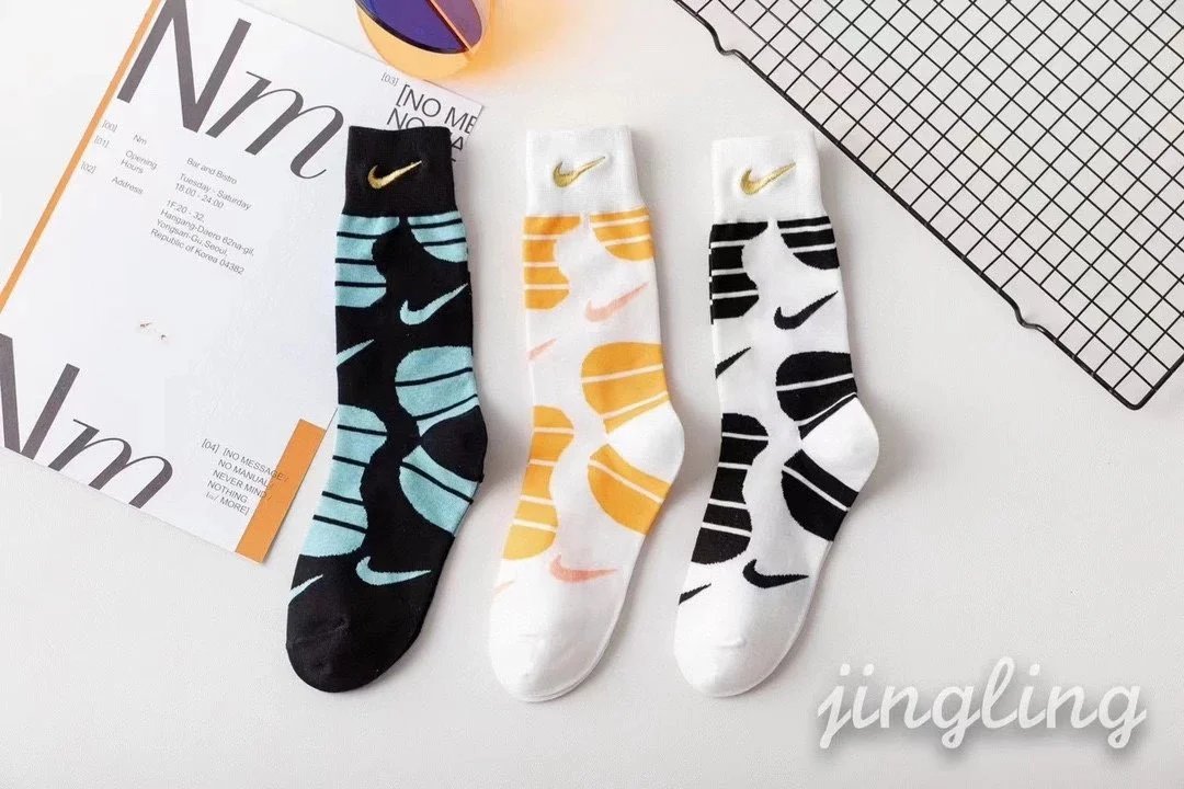 Nike Swoosh Logo Crew Socks in Navy, White, Gray, Black, and Charcoal - 11