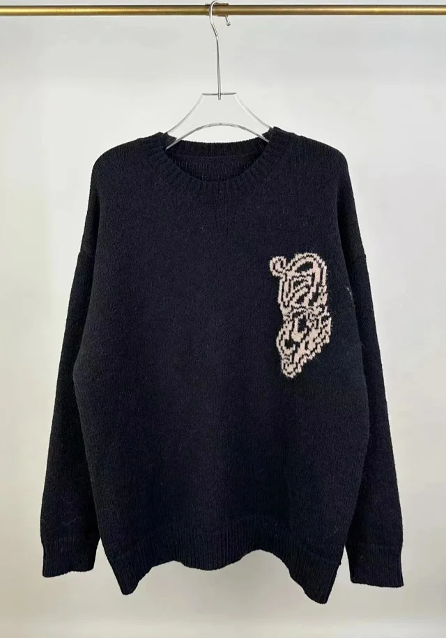 Off-White Knitwear Crewneck knit sweater with graphic intarsia product detail image 1