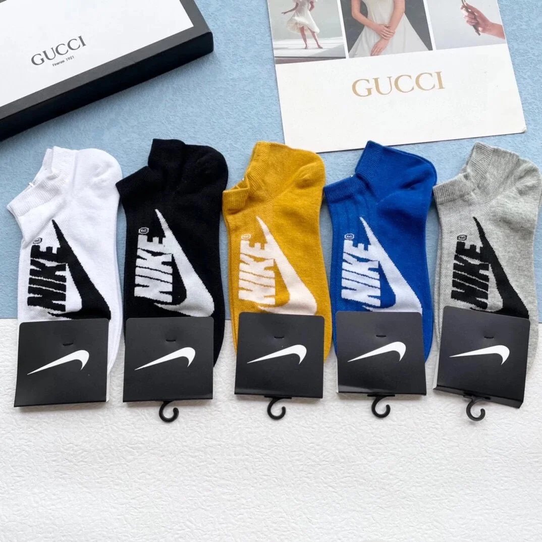 Nike Swoosh Logo Crew Socks in Navy, White, Gray, Black, and Charcoal - 16