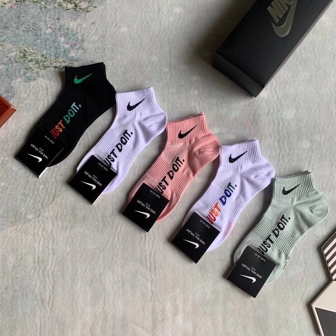Nike Swoosh Logo Crew Socks in Navy, White, Gray, Black, and Charcoal - 3