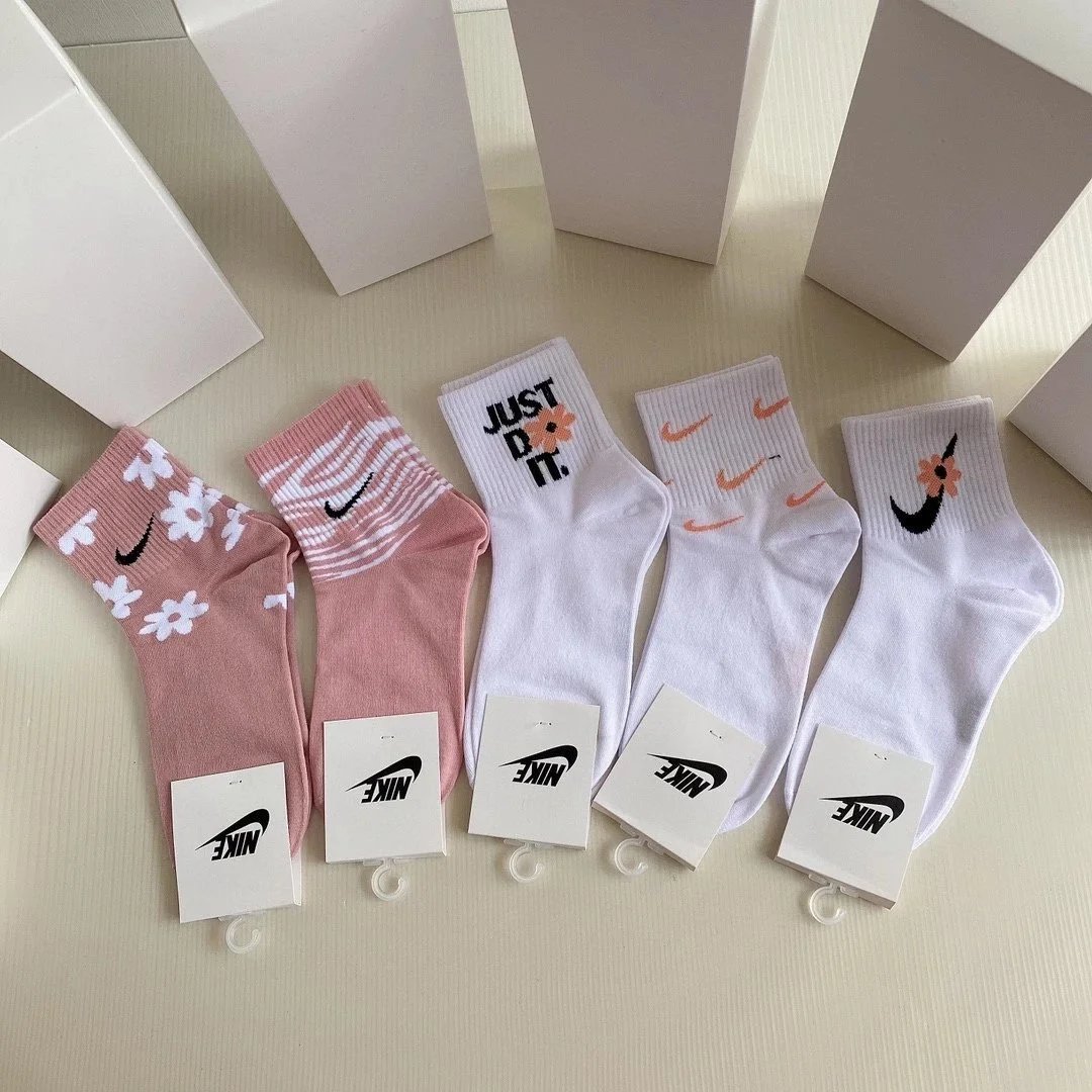 Nike Swoosh Logo Crew Socks in Navy, White, Gray, Black, and Charcoal - 13