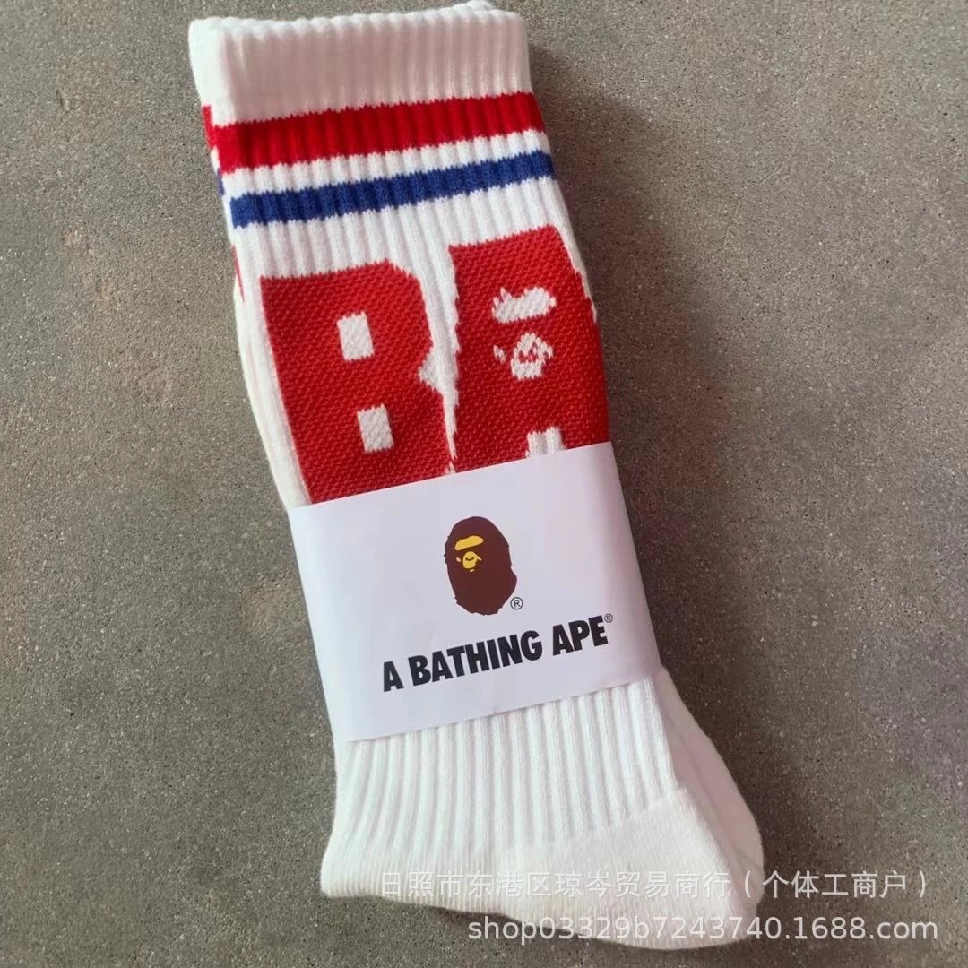 A Bathing Ape Socks Striped logo crew — Striped red large letters