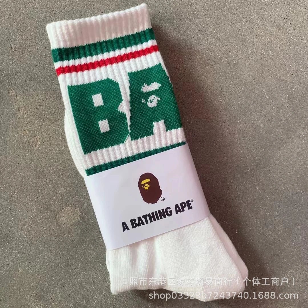 A Bathing Ape Socks Striped logo crew — Striped green large letters