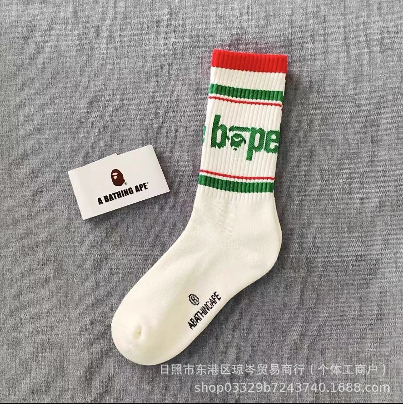 A Bathing Ape Socks Striped logo crew — Wide stripes of green and red