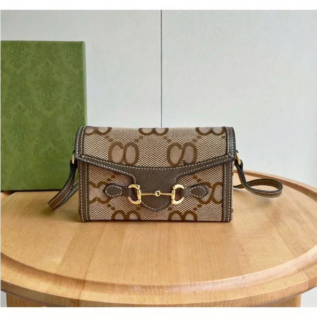 Gucci Crossbody Bags GG monogram horsebit flap — brown coke