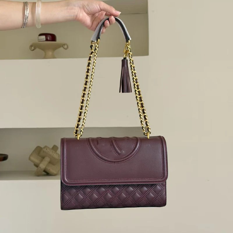 Tory Burch Shoulder Bags Quilted flap bag with chain strap and tassel image 1