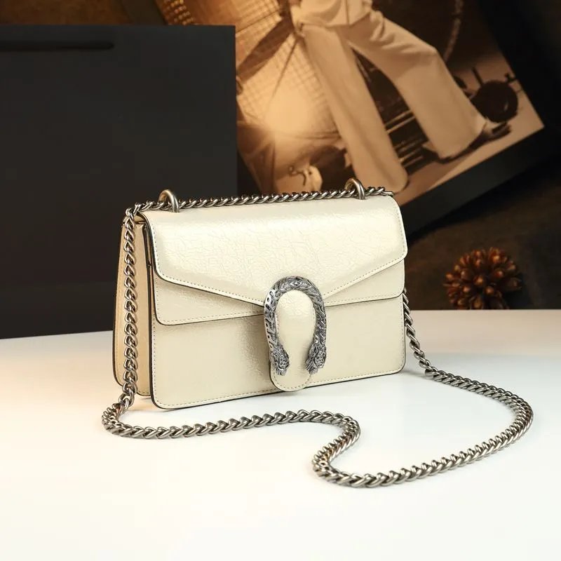 Unbranded Crossbody Bags Flap bag with chain strap and textured U-shaped clasp — Beige