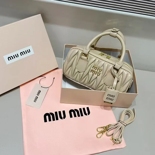 Miu Handbags Quilted Top-Handle Boston Bag product detail image 1