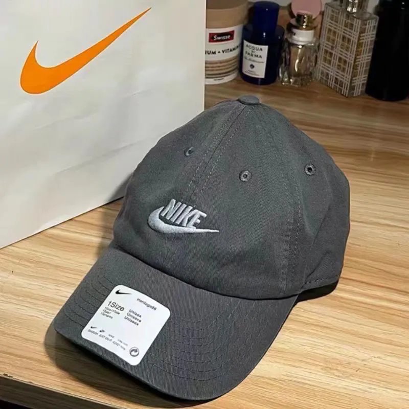 Nike Hats Washed cotton baseball cap with embroidered logo — Washed gray