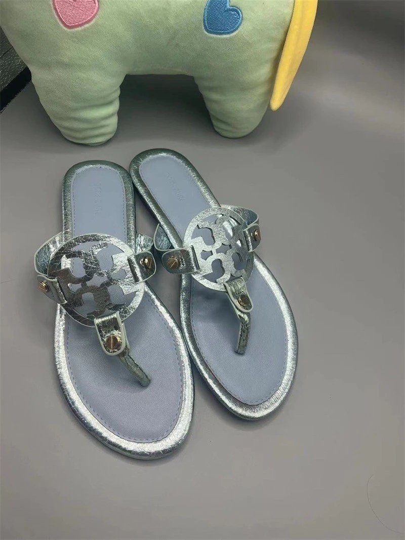 Tory Burch Sandals Flat thong with cutout double-T medallion — snakeskin blue