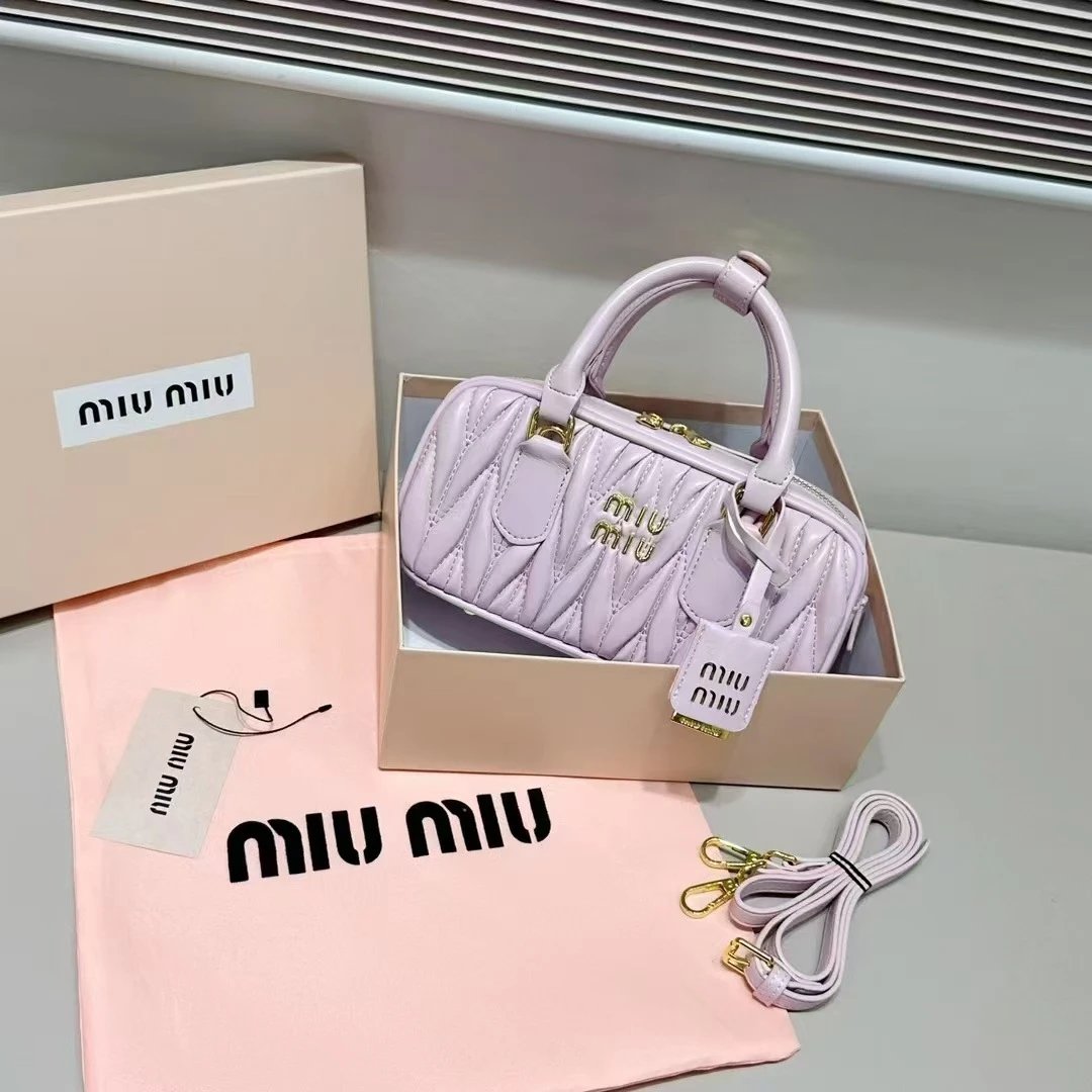 Miu Handbags Quilted Top-Handle Boston Bag image 1