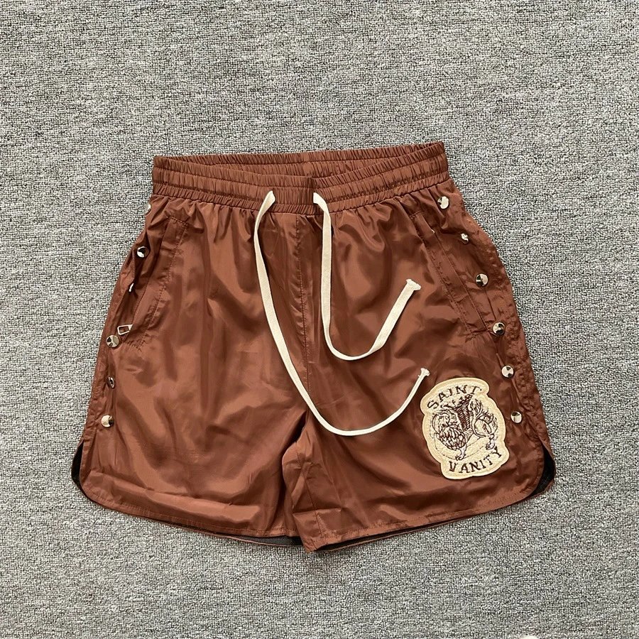 Saint Vanity Shorts Drawstring with embroidered patch and side rivets — Coffee color